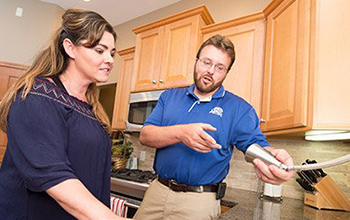 Jack, one of our plumbers in Millbrae, CA is explaining to the client why this newloly installed faucet is better than the old one