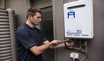 Jake is installing a tankless water heater in Millbrae, California